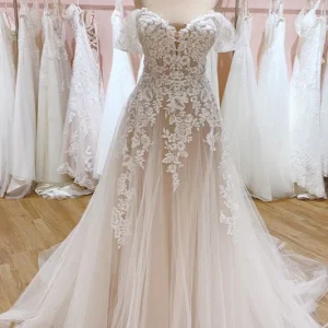 Elegant Off-Shoulder A-Line Wedding Gown with Sweetheart Backless Tulle and Train