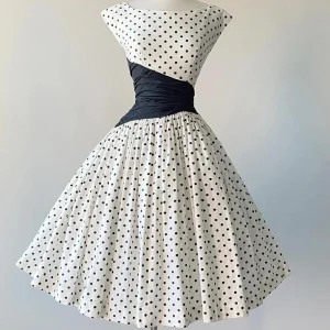 Cap Sleeve Vintage 50s Polka Dot Swing Dress with Black Asymmetrical Waist Panel