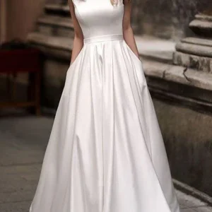 Lange Vintage Bateau Neck bescheiden satijnen trouwjurk met zakken