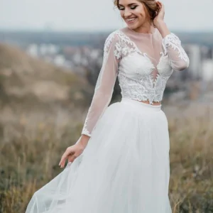 Moderne rustieke kanten crop-top trouwjurk met lange mouwen, bruidsjurk met tule rok