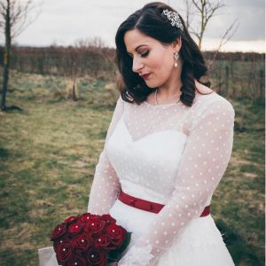 Betaalbare retrostijl jaren 50 stippen-theelengte bruidsjurk met lange kanten appliqués manchetmouwen