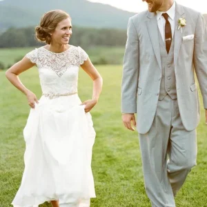 Elegante rustieke kapmouwtjes kanten top tuin trouwjurk