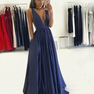 Sexy blauwe eenvoudige formele galajurk met zakken, lange avondjurk in diepe v-hals